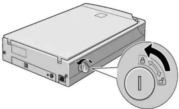 Illustration of a computer drive with a close-up inset showing a rotary switch (no text or symbols)
