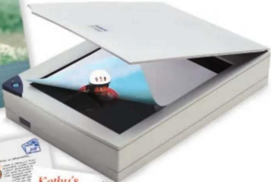Open scanner with a person wearing a white helmet looking out of its window (no visible text or symbols)
