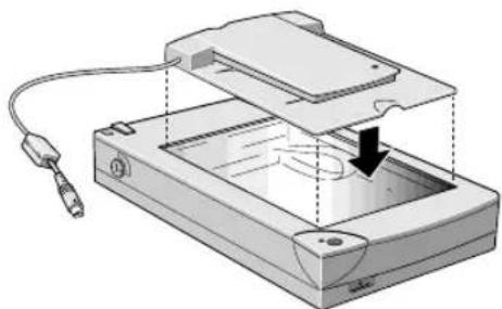 Diagram of a device with an open lid and cable, showing internal components and a downward arrow (no text or symbols)