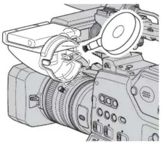 Line drawing of a professional video camera with lens and control panel (no text or symbols)