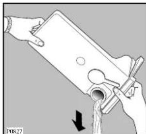 Illustration of hands pouring liquid from a container into a pipe (no text or symbols)