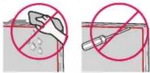 Two safety diagrams showing a hand holding a tool with a prohibition symbol, alongside a second diagram of a tool inside a container.