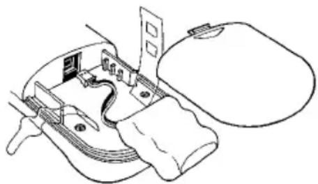 Technical line drawing of a mechanical device with internal components and a handle (no text or symbols)