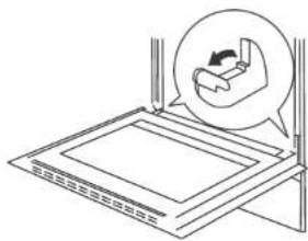 Diagram of a mechanical assembly with a magnified inset showing a hand pressing a component (no text or symbols present)