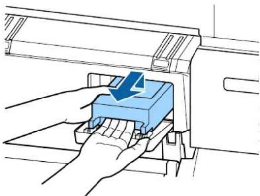 Illustration of a hand pressing a blue component into a machine (no text or symbols visible)