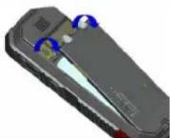 Close-up of a handheld electronic device with blue circular annotations on its surface (no visible text or symbols)