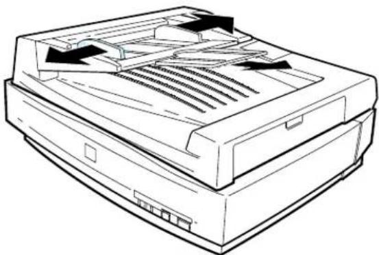 Line drawing of a printer with ventilation slots and paper feed (no text or symbols)