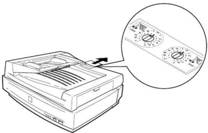 Diagram showing a printer with a magnified view of its internal control dial, labeled in millimeters.