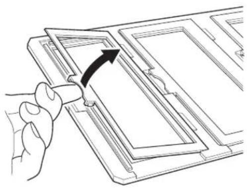 Line drawing of a hand inserting a component into a device panel (no text or symbols)