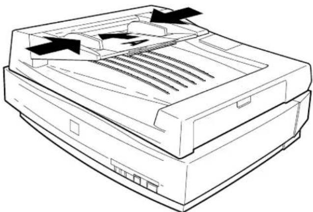 Line drawing of a printer with ventilation slots and arrows indicating airflow direction (no text or symbols)