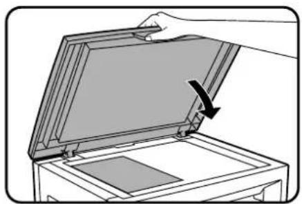 Illustration of a hand opening a rectangular device with an arrow indicating the open lid (no text or symbols present)