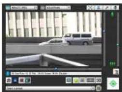Exterior view of a modern office building with a parked car in front (no visible signage or text)