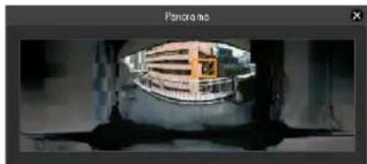 Interior view of a modern building with a circular structure and orange signage (no readable text or symbols)