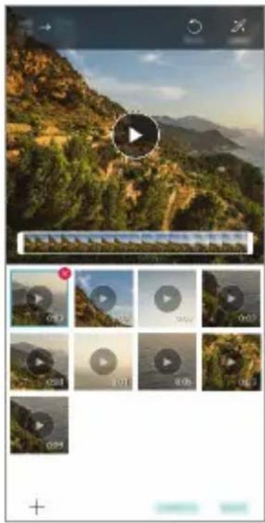 Mountain landscape with a play button overlay, showing video thumbnails and UI elements (no readable text or symbols)