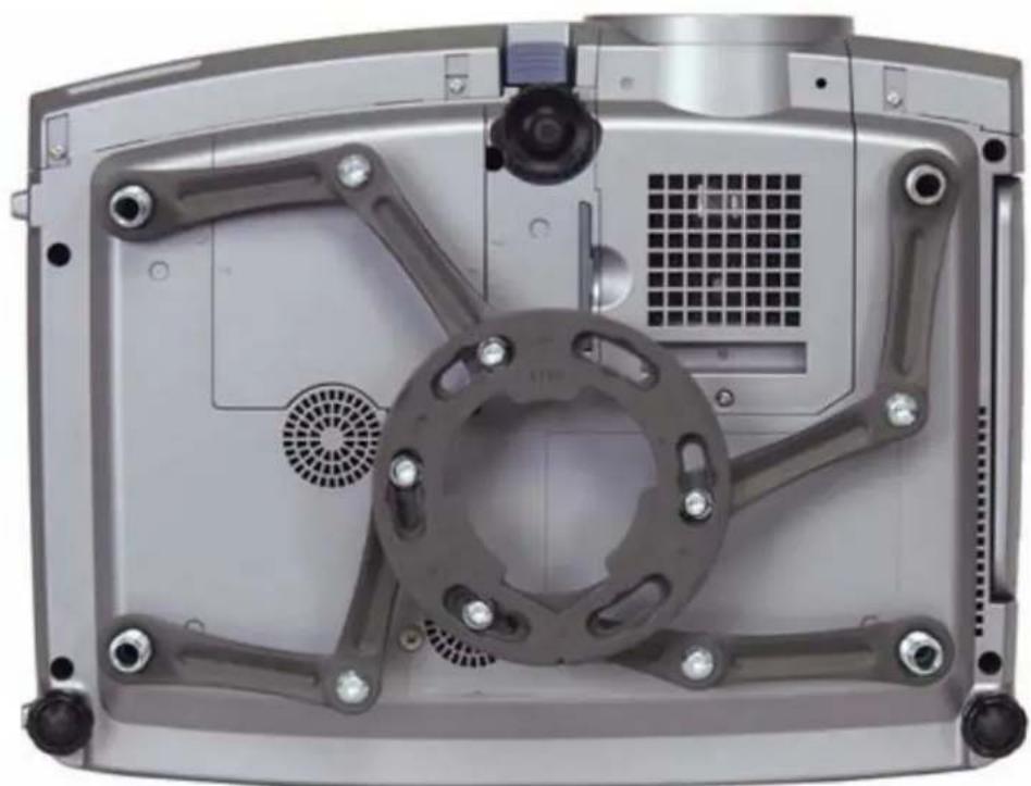 Interior view of a computer monitor case with visible mechanical components and ventilation slots (no text or symbols)