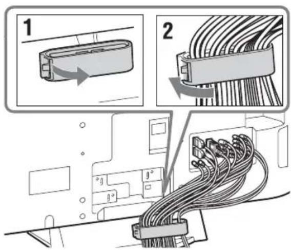 Diagram showing cable connection steps with labeled components and directional arrows indicating rotation or movement.