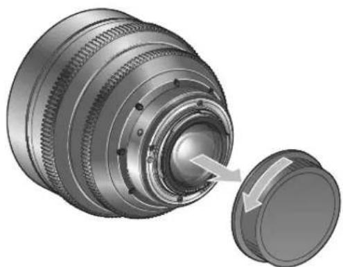 Mechanical assembly diagram showing a cylindrical component with threaded ends and a separate circular component with an arrow indicating motion (no text or symbols present)