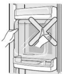 SMEG SS55PT3 - Non appoggiare oggetti pesanti sullo sportello del vano refrigerante ed impedire ai bambini di appendersi ad esso. - 1