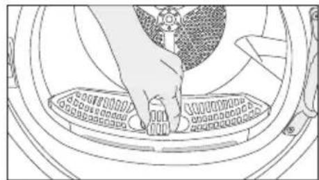 Line drawing of a hand pressing down on a circular mechanical component (no text or symbols)