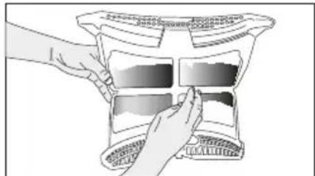 Illustration of hands holding a transparent container with four compartments (no text or symbols visible)