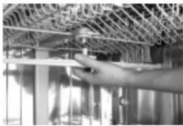 Hand adjusting a metal frame structure (no visible text or symbols)