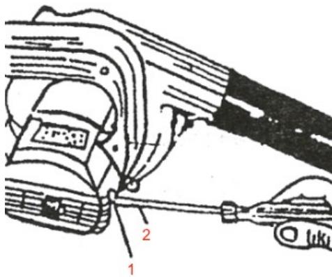 Technical diagram showing a hand operating a tool with labeled parts 1 and 2