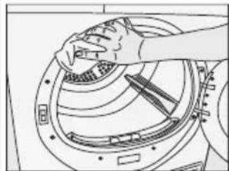 Line drawing of a hand adjusting a circular component with tools (no text or symbols)