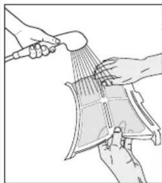 Line drawing of hands using a tool to clean or adjust a curved object (no text or symbols present)
