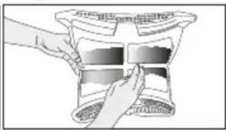 Illustration of hands placing a component into a container with a tray (no text or symbols visible)