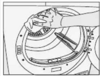 Line drawing of a hand adjusting a circular component with tools, no text or symbols present