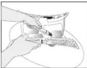 Illustration of hands using a tool to apply material or equipment (no text or symbols visible)