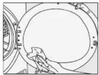 Line drawing of hands cleaning a circular object with a brush (no text or symbols)