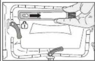 Diagram showing a hand holding a device with a lock and directional arrow, likely illustrating a mechanical or electrical component.