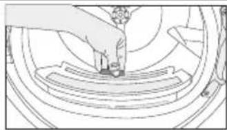 Technical line drawing of a mechanical assembly with a hand operating a tool (no text or symbols)