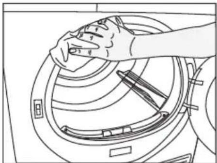 Line drawing of hands cleaning a washing machine (no text or symbols)