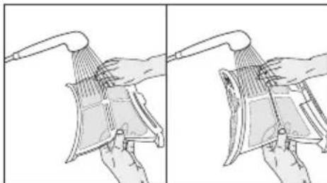 Illustration of a hand holding a showerhead with a device, showing two sequential steps (no text or symbols)