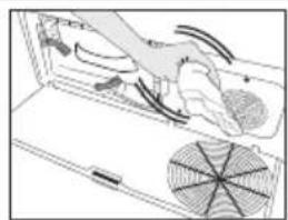 Diagram of a hand inserting a fan into an air conditioner unit (no text or symbols visible)