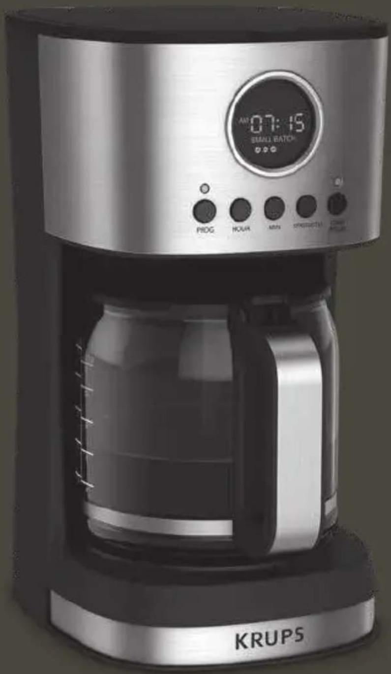 Exterior view of a KRUPS coffee maker with digital clock and control buttons (no text or symbols on main body)