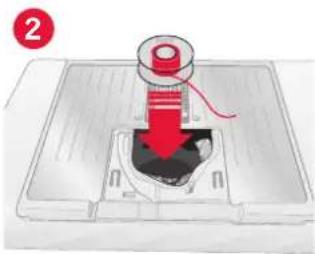 Illustration of a red mechanical component inserted into a container, with no visible text or symbols.