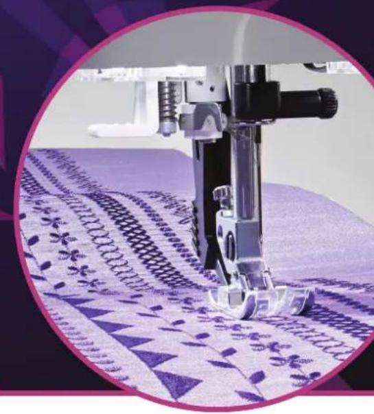 Close-up of a sewing machine needle stitching purple fabric with patterned threads (no visible text or symbols)