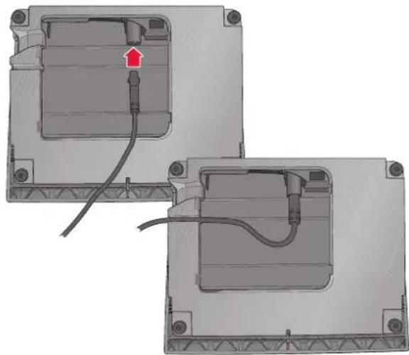 Two views of a mechanical or electronic component with visible wiring and a red arrow indicating a specific part (no text or symbols present)
