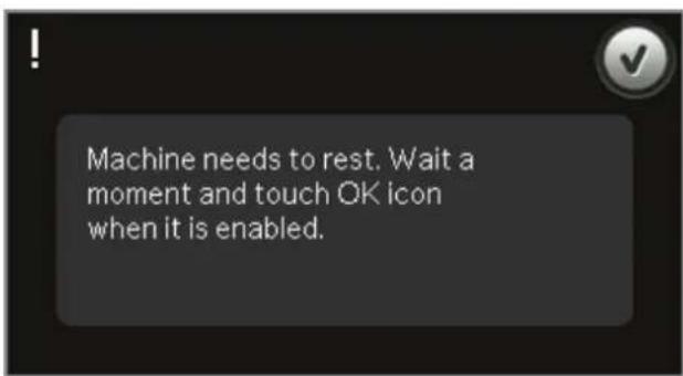 Machine needs to rest. Wait a moment and touch OK icon when it is enabled.