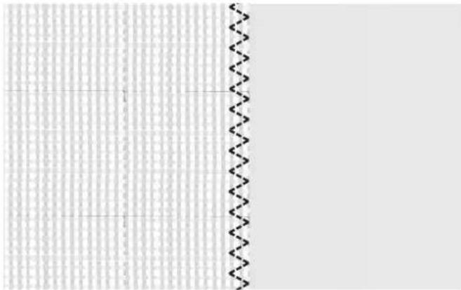 Cropped document page with dense grid of text and a zigzag line on the right side, likely a form or template.