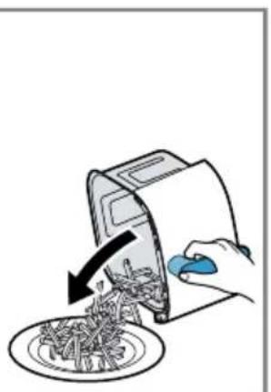 Illustration of a hand using a tool to remove leafy vegetables from a tray (no text or symbols)