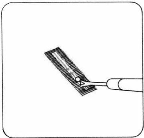 Simple line drawing of a tool interacting with a striped surface (no text or symbols)