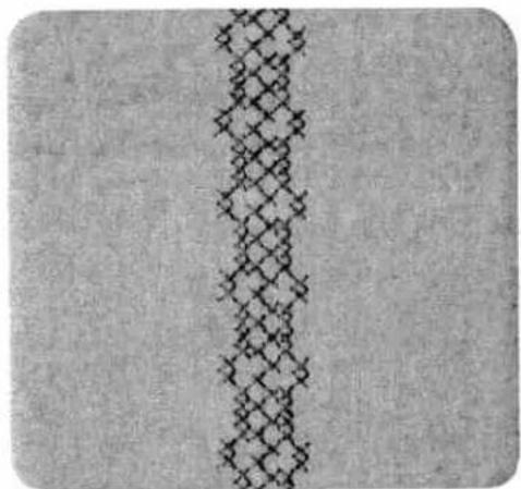 Abstract pattern of interlocking diamond shapes on a textured gray background (no text or symbols)