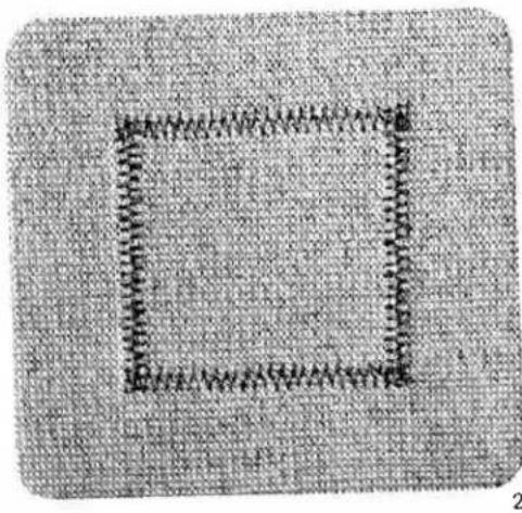 Close-up of a textured fabric with a square frame and stitching pattern (no text or symbols)