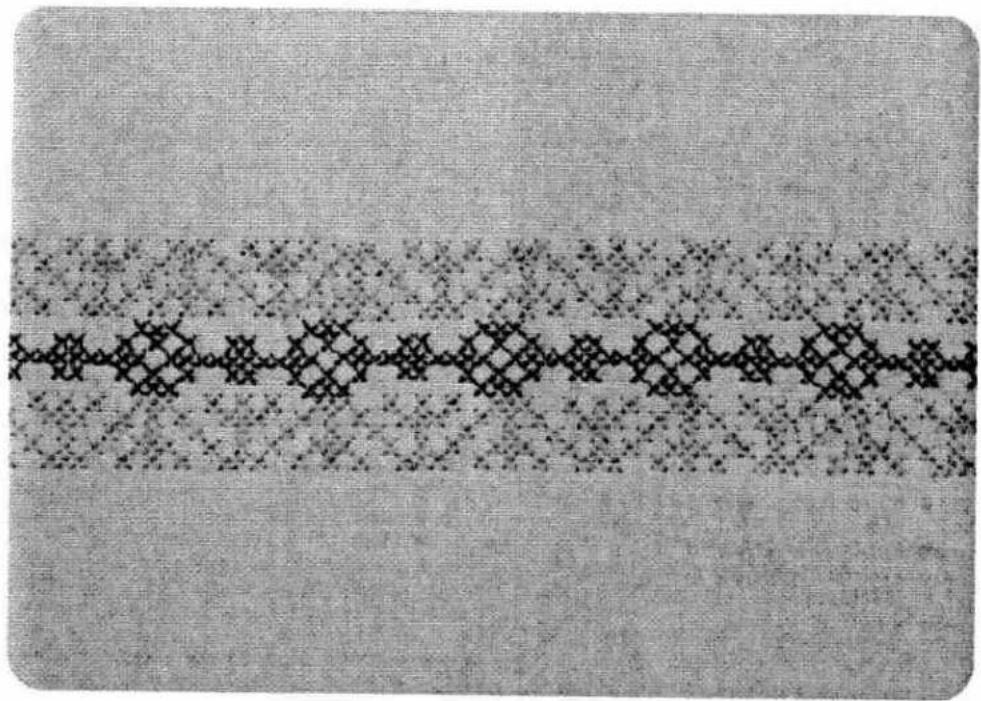 Abstract pattern of repeating black dots and diamonds on a textured gray background (no text or symbols)