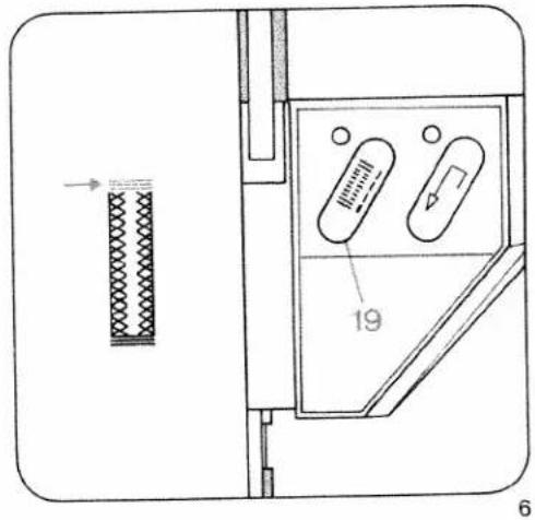 Technical diagram of a device with labeled components and directional arrow, showing internal structure and numbered parts.