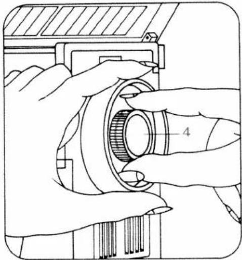 Illustration of hands operating a mechanical component with a numbered part (4), no text or symbols present.